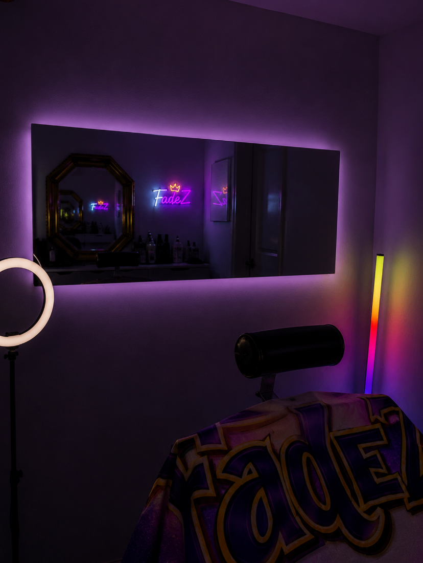 Fadez neon sign glowing above the studio station